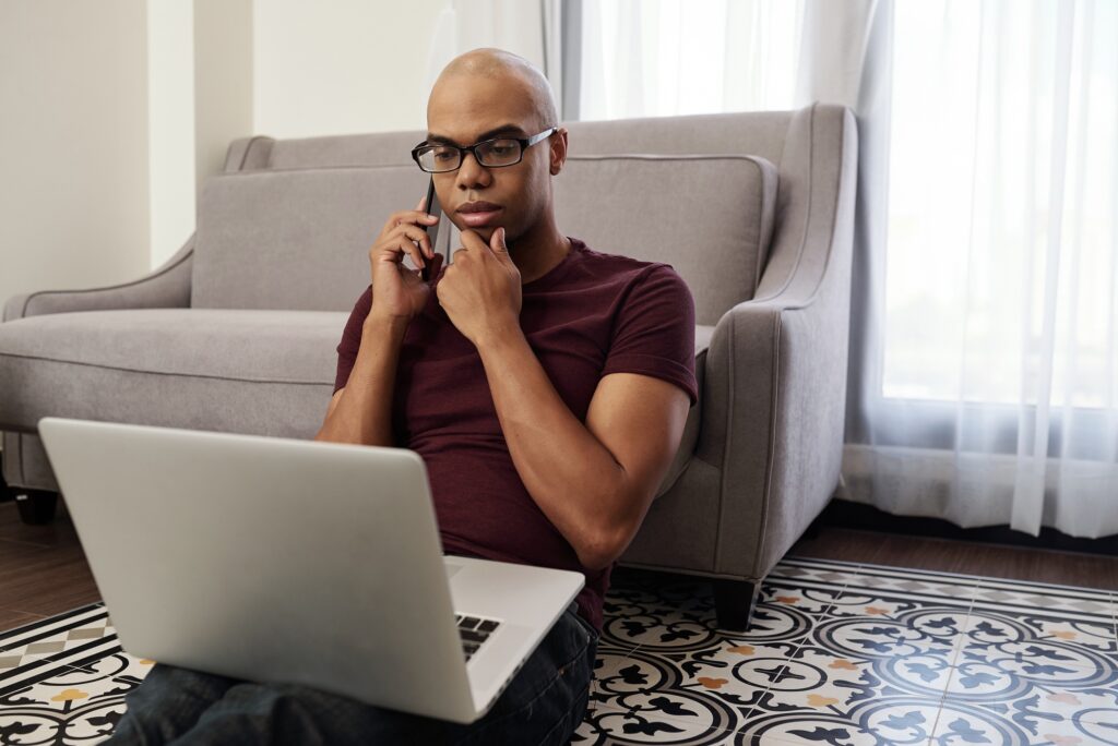 Freelancer talking on phone with client